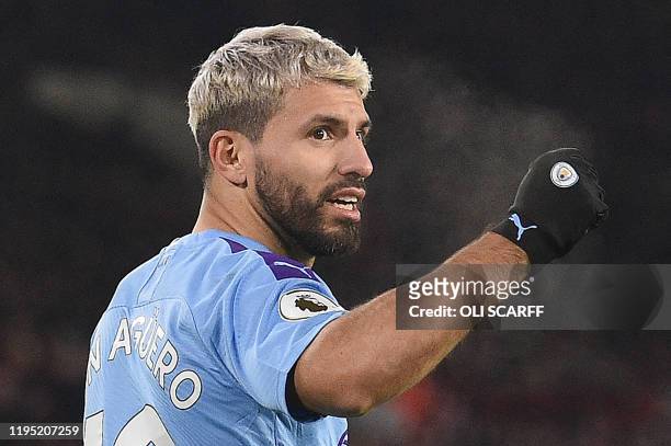 Manchester City's Argentinian striker Sergio Aguero celebrates scoring the opening goal during the English Premier League football match between...