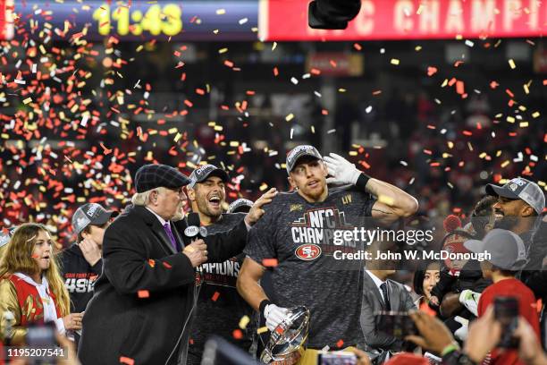 Playoffs: Fox Sports analyst Terry Bradshaw with San Francisco 49ers QB Jimmy Garoppolo and George Kittle victorious holding NFC Championship trophy...