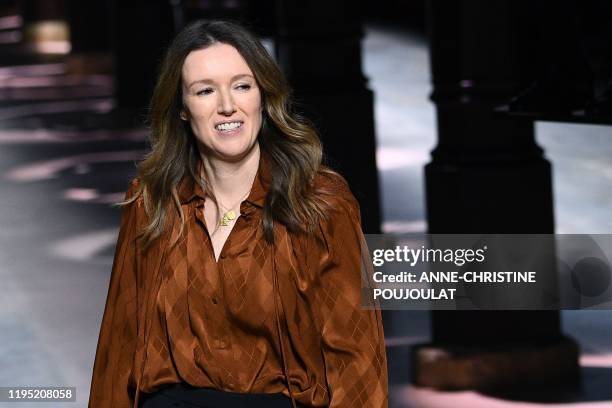 British fashion designer for Givenchy, Clare Waight Keller, acknowledges the audience at the end of the Women's Spring-Summer 2020 Haute Couture...