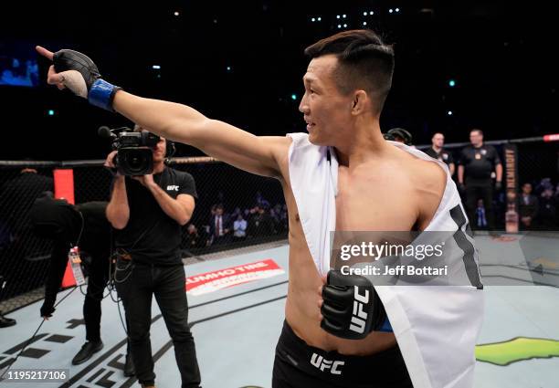 Chan Sung Jung of South Korea celebrates after knocking out Frankie Edgar in their featherweight fight during the UFC Fight Night event at Sajik...