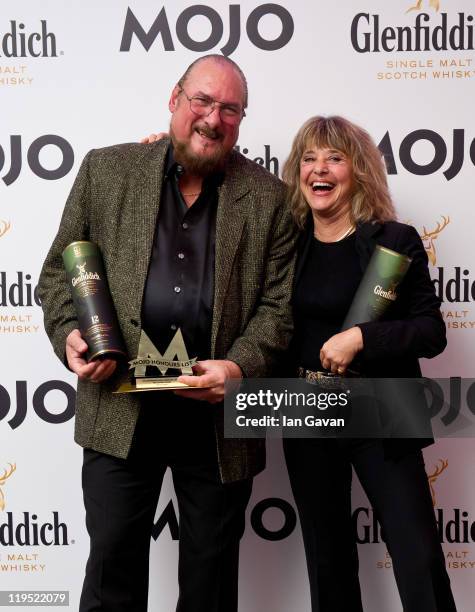 Suzi Quatro poses with Steve Cropper after presenting him with the MOJO Les Paul Award in front of the winners boards at the Glenfiddich Mojo Honours...