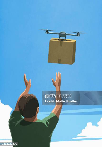 man releasing drone with cardboard box delivery - drone stock illustrations