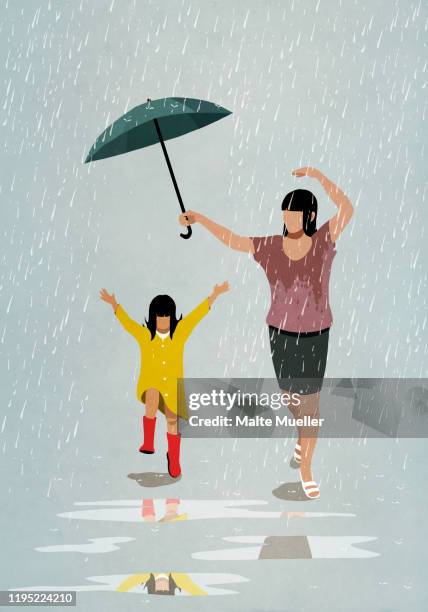 carefree mother and daughter dancing in rain - mother protecting from rain stock-grafiken, -clipart, -cartoons und -symbole