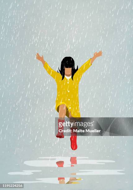 carefree girl jumping in rain puddles - fröhlich stock-grafiken, -clipart, -cartoons und -symbole