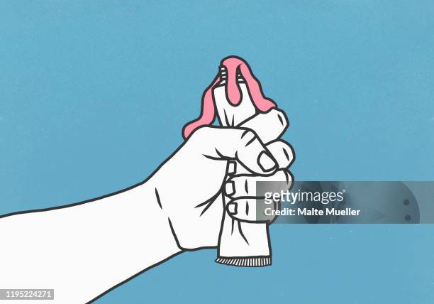 hand squeezing tube of toothpaste - aggression stock illustrations