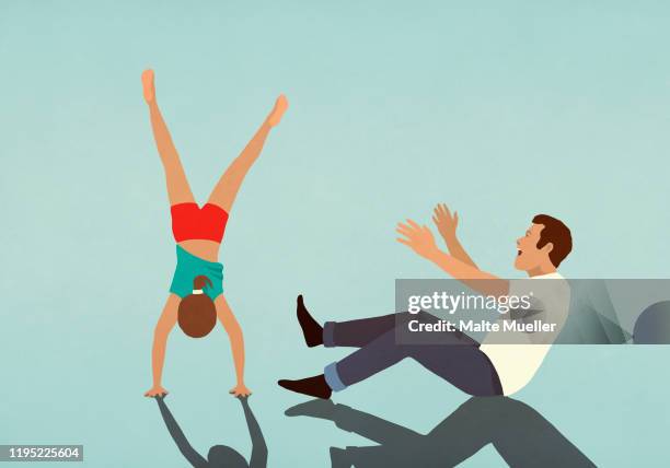 happy father cheering for daughter doing handstand - simple living stock illustrations