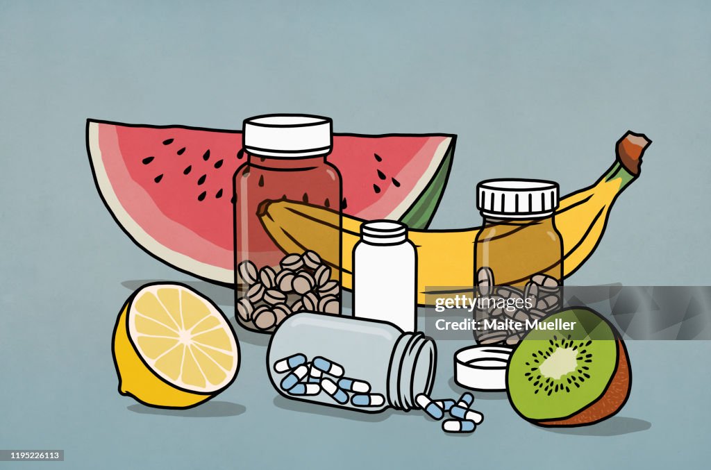 Still life fruit and supplement medication bottles