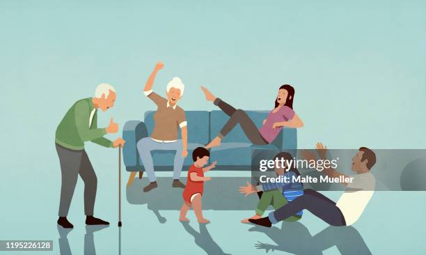 ilustrações, clipart, desenhos animados e ícones de happy multi-generation family cheering in living room - grupo médio de pessoas