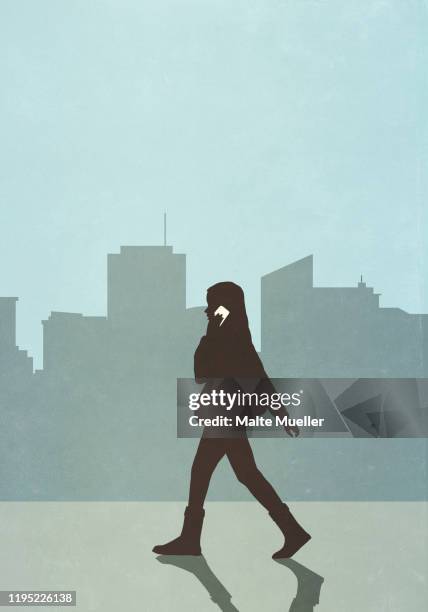 woman walking and talking on smart phone in city - woman walking side view stock illustrations