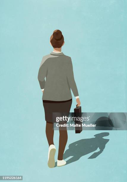 businesswoman in sneakers walking with briefcase - business casual stock illustrations