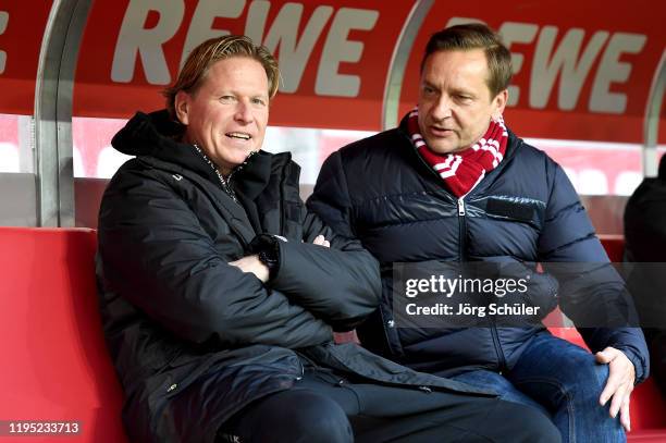 Markus Gisdol, Head Coach of 1. FC Koeln and Horst Heldt, Sporting Director of 1. FC Koeln look on prior to the Bundesliga match between 1. FC Koeln...