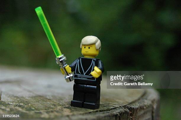 Lego Minifigure - Luke Skywalker from Return of the Jedi. Shot outdoors, natural lighting.
