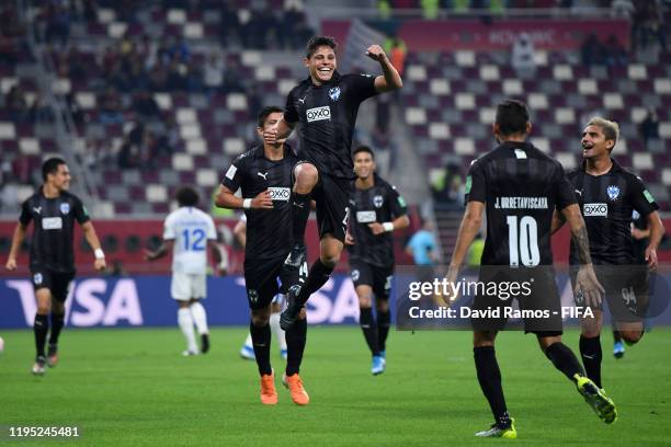 Arturo Gonzalez of C.F. Monterrey celebrates with teammates Jonathan Urretaviscaya and William Meija of C.F. Monterrey after scoring his team's first...