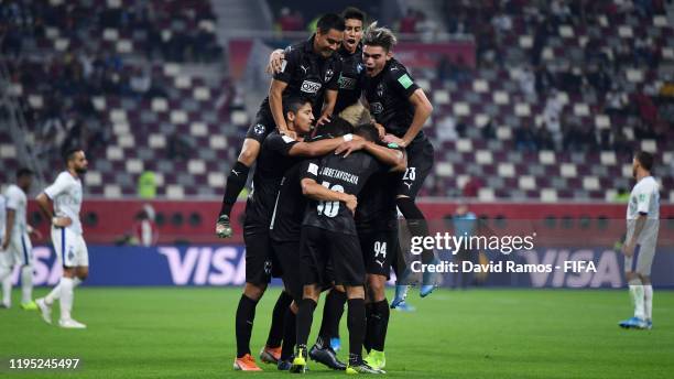 Arturo Gonzalez of C.F. Monterrey celebrates with teammates after scoring his team's first goal during the FIFA Club World Cup Qatar 2019 3rd place...