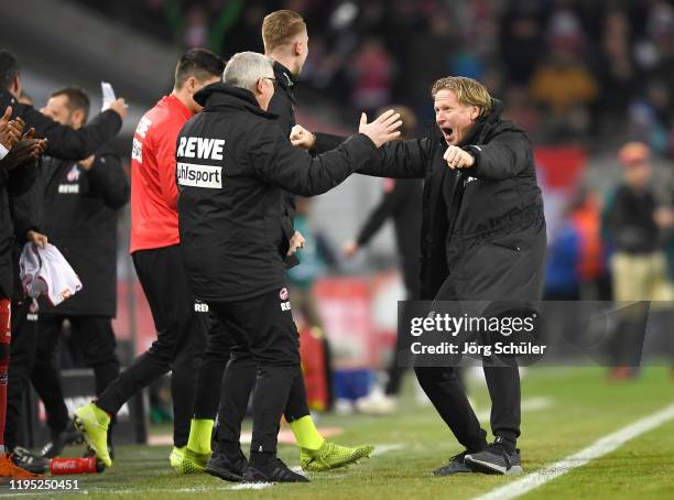 Markus Gisdol, Head Coach of 1. FC Koeln celebrates at full-time after the Bundesliga match between 1. FC Koeln and SV Werder Bremen at...