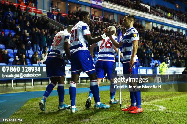 Lucas Joao of Reading celebrates with his teammates after scoring his sides second goal during the Sky Bet Championship match between Reading and...