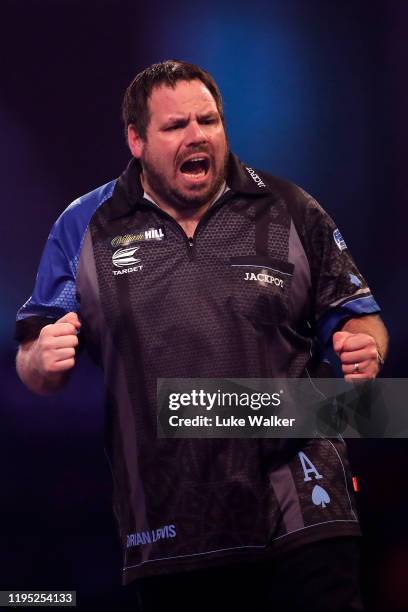 Adrian Lewis reacts during the round 2 match between Adrian Lewis and Christo Reyes on Day 9 of the 2020 William Hill World Darts Championship at...