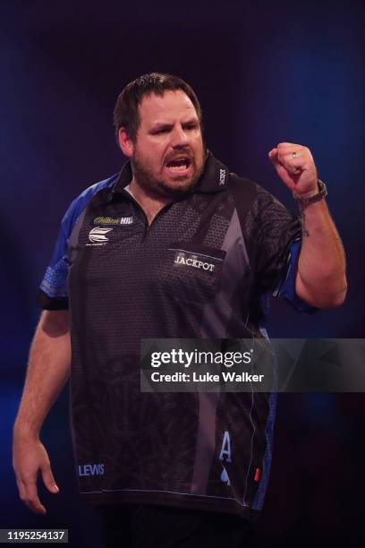 Adrian Lewis reacts during the round 2 match between Adrian Lewis and Christo Reyes on Day 9 of the 2020 William Hill World Darts Championship at...