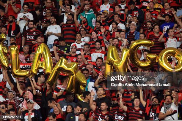 Flamengo fans show their support during the FIFA Club World Cup final match between CR Flamengo and Liverpool FC at Khalifa International Stadium on...