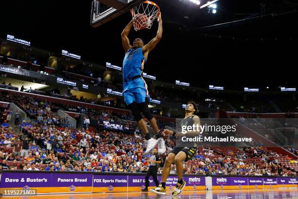 Trent Forrest of the Florida State Seminoles dunks against the South Florida Bulls during the second half of the Orange Bowl Basketball Classic at...