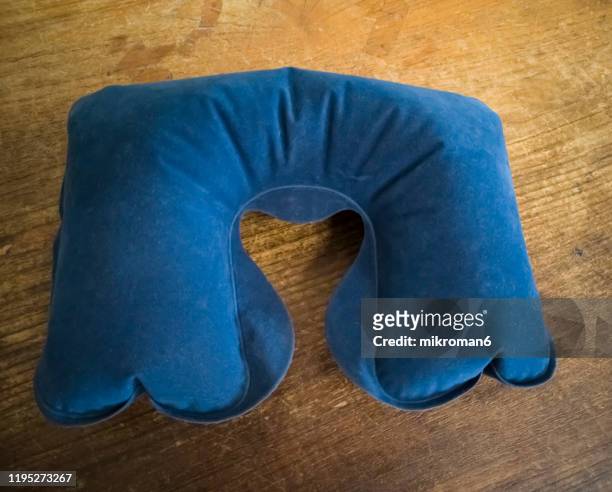 blue u-shaped travel neck pillow - nackstöd bildbanksfoton och bilder