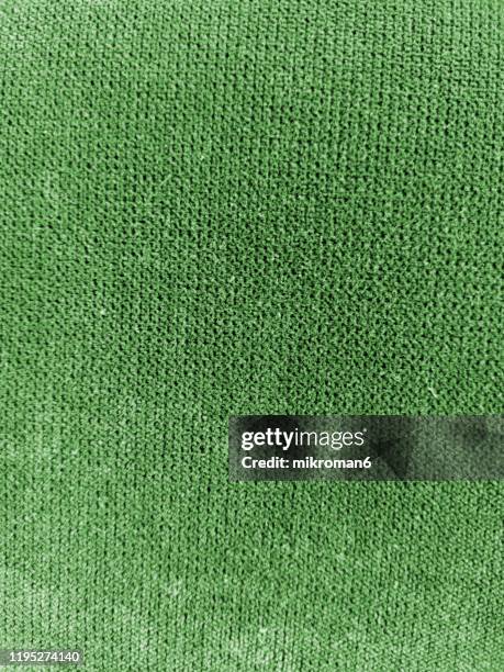 green sweater background - knitted stock pictures, royalty-free photos & images