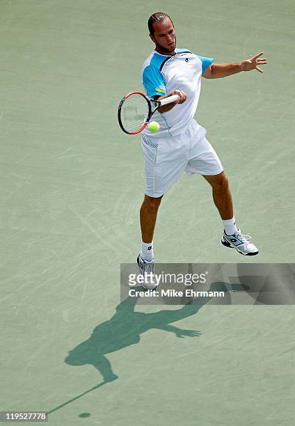 Xavier Malisse of Belgium plays a forehand during a match against Ryan Harrison at the Atlanta Tennis Championships at the Racquet Club of the South...