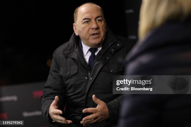 Axel Weber, chairman of UBS Group AG, gestures as he speaks during a Bloomberg Television interview on day two of the World Economic Forum in Davos,...