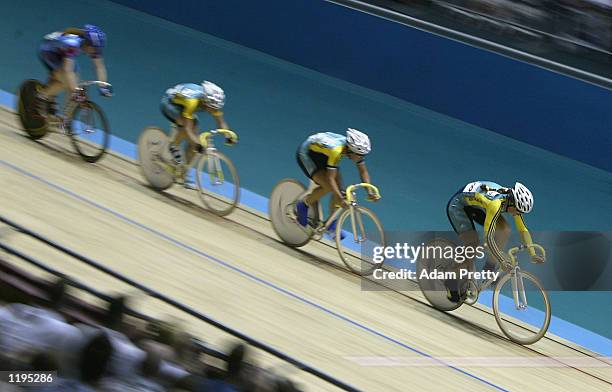 Katherine Bates leads Rochelle Gilmore and Alison Wright of Australia during the Women's 25 km Points Race Final, at the National Cycling Centre...