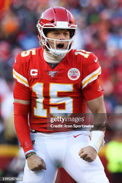 Kansas City Chiefs quarterback Patrick Mahomes raises his arms in celebration after completing a 20-yard touchdown pass to wide receiver Tyreek Hill...