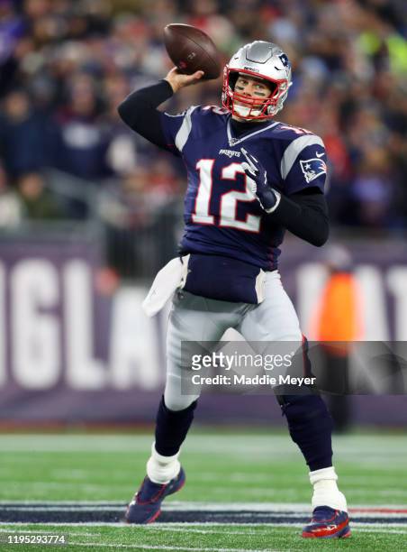Tom Brady of the New England Patriots looks to pass during the first half against the Buffalo Bills at Gillette Stadium on December 21, 2019 in...