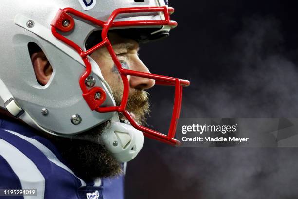 Julian Edelman of the New England Patriots looks on during the first half of the game against the Buffalo Bills at Gillette Stadium on December 21,...