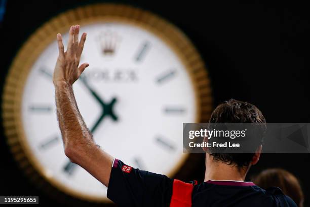 Roger Federer of Switzerland celebrates to the crowd after his straight sets victory in his Men's Singles second round match against Filip Krajinovic...