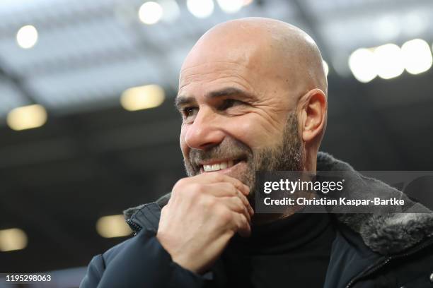 Peter Bosz, Head Coach of Bayer 04 Leverkusen looks on prior to the Bundesliga match between 1. FSV Mainz 05 and Bayer 04 Leverkusen at Opel Arena on...