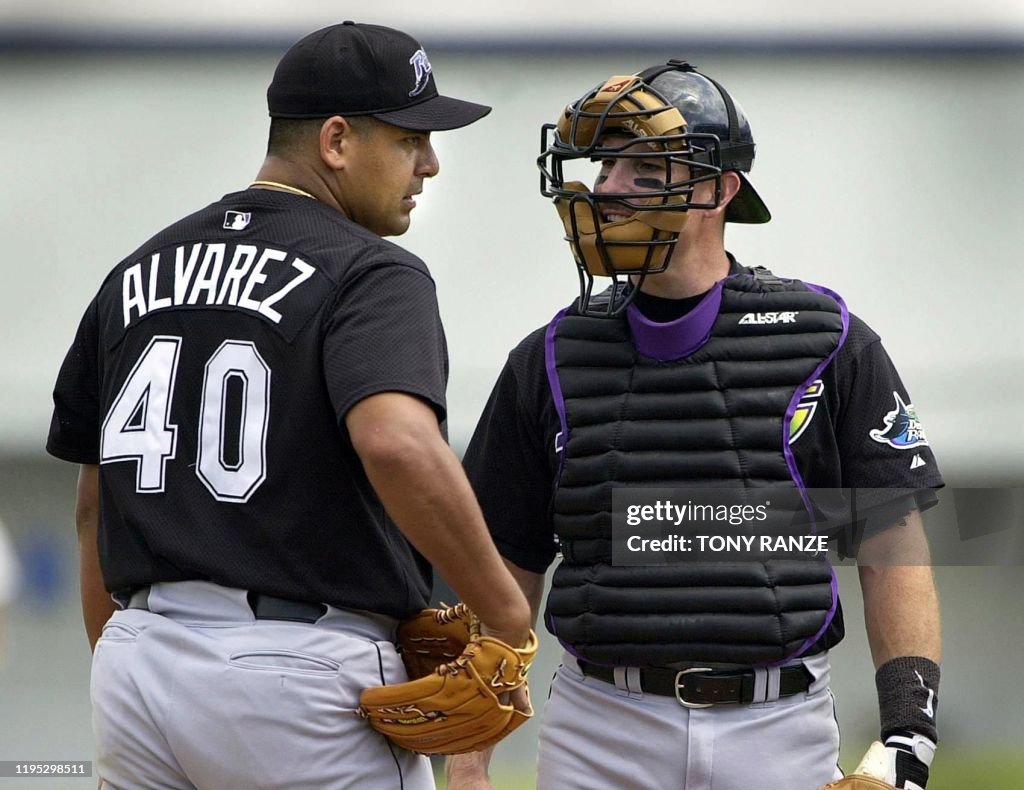 Al Reyes Devil Rays Tampa Bay Devil Rays' catcher John Flaherty takes a timeout to talk ...