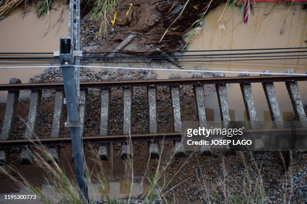 Flooded train tracks are pictured in Malgrat de Mar, near Girona on January 22 as storm Gloria batters Spanish eastern coast. - A winter storm which...