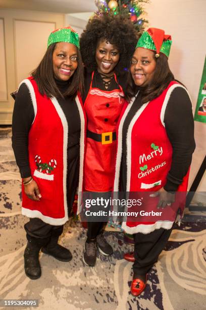 Brenda Wilson, Reid Johnson Rich and Lynda Moran attend the New Image 25th Annual Children's Christmas Store at The Hilton Hotel on December 21, 2019...