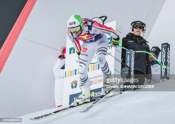 Dominik Schwaiger of Germany takes the start of his first practice run for the men's downhill event at the FIS Alpine Ski World Cup in Kitzbuehel,...