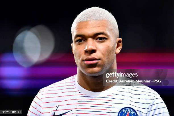 Kylian Mbappe of Paris Saint-Germain looks on during warmup before the Ligue 1 match between Paris Saint-Germain and Amiens SC at Parc des Princes on...