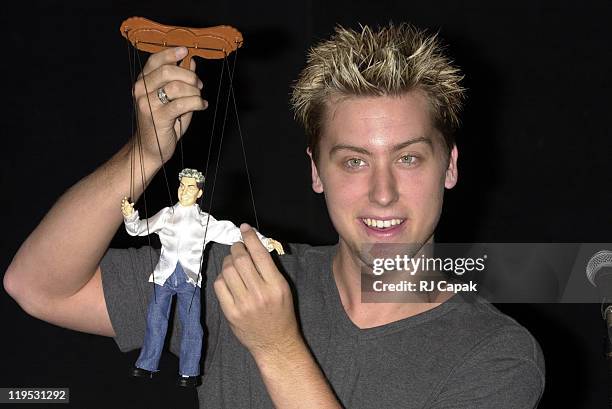 Lance Bass during *NSYNC hosts unveiling of their look-alike Marionettes at FAO Schwarz in New York City, New York, United States.