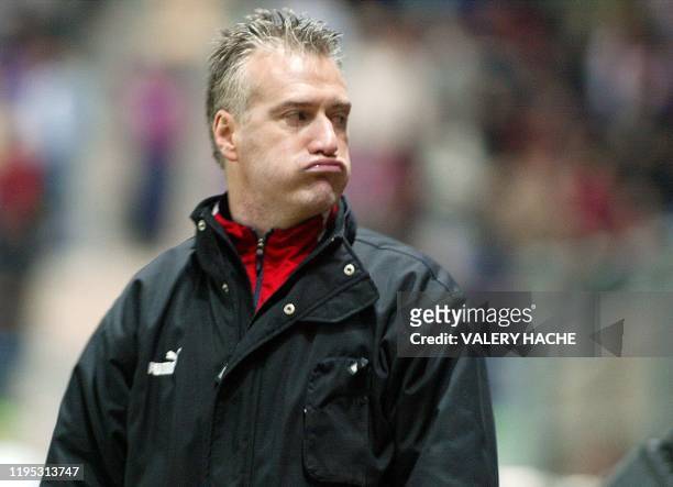 Monaco's coach Didier Deschamps reacts after loosing the French League Cup semi final football match against Caen, 02 February 2005 at Malherbe...