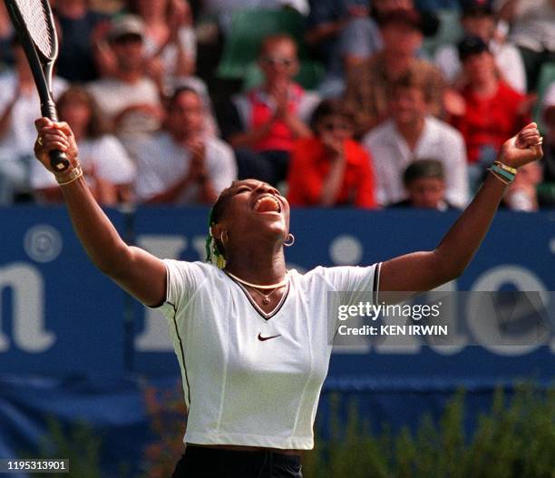 Serena Williams of the US celebrates after defeating sixth seed Irena Spirlea of Romania in the first round of the 1998 Australia Open in Melbourne...