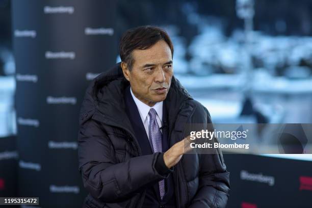 Takeshi Niinami, president and chief executive officer of Suntory Holdings Ltd., gestures as he speaks during a Bloomberg Television interview on day...
