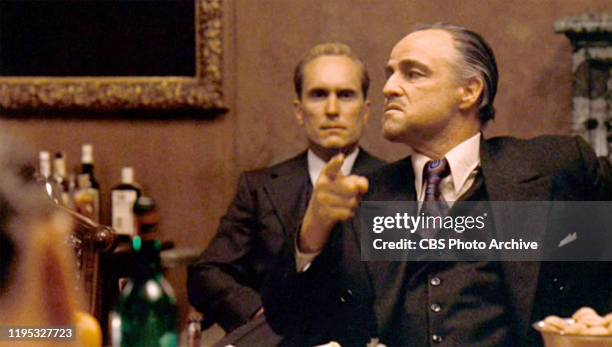 Robert Duvall as Tom Hagen and Marlon Brando as Don Vito Corleone in 'The Godfather, ' the movie based on the novel by Mario Puzo and directed by...