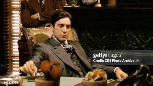 Al Pacino as Michael Corleone in 'The Godfather, ' the movie based on the novel by Mario Puzo and directed by Francis Ford Coppola. This scene takes...
