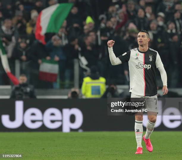 Cristiano Ronaldo of Juventus celebrates after scoring the opening goal during the Coppa Italia Quarter Final match between Juventus and AS Roma at...