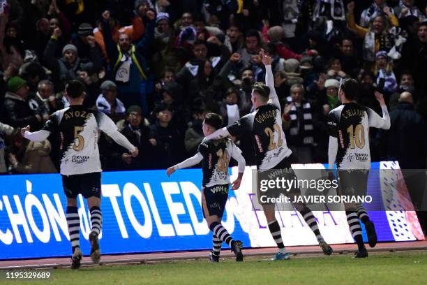 Unionistas' Spanish forward Alvaro Romero celebrates his goal during the Copa del Rey football match between Unionistas de Salamanca CF and Real...