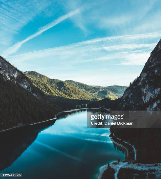 lago di braies italian lake drone aerial - lago reflection stock pictures, royalty-free photos & images