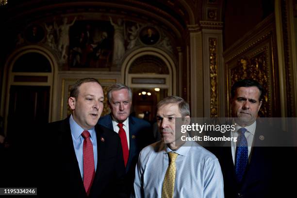 Representative Lee Zeldin, a Republican from New York, left, speaks to members of the media as Representative John Ratcliffe, a Republican from...