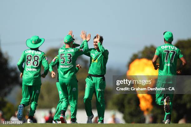 The Stars celebrate the dismissal of David Miller of the Hurricanes during the Big Bash League match between the Melbourne Stars and the Hobart...